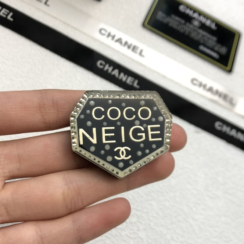 Ch*el brooches